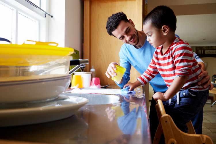 dad teaches son to wash dishings gender gap closure