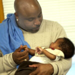 Darren W. Carter and his godson, Jo Jo.