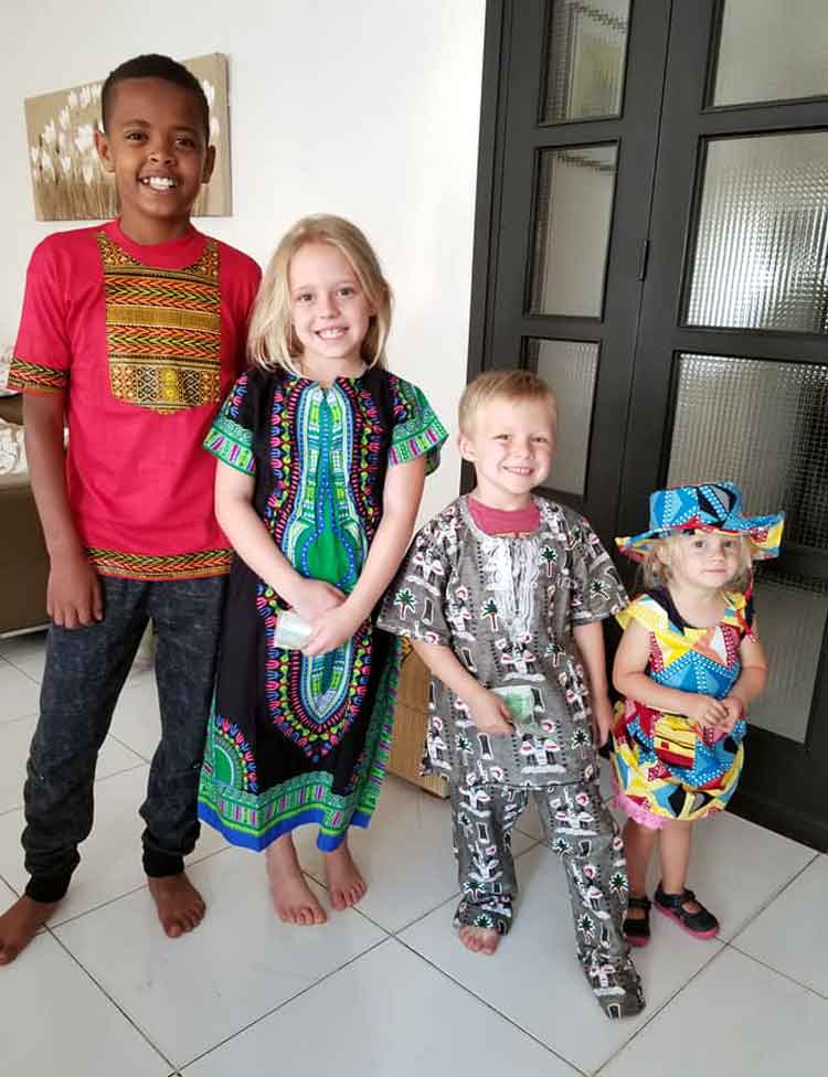 The Walsh children dressed in traditional African clothing for their recent trip to Senegal. (Photo: Tobin Walsh Family)