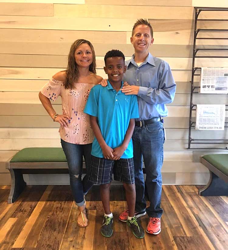 Adoption: Tobin and Aimee Walsh and their son, Yosepf