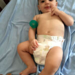 baby isaac in a huggies little snuggler diaper