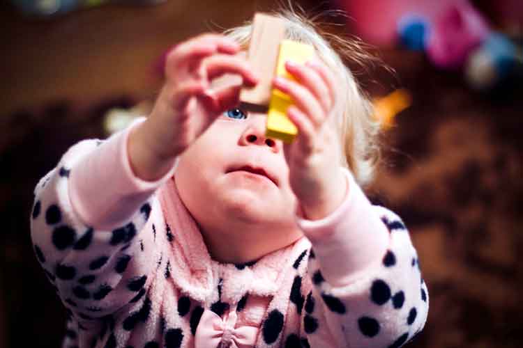 find the best daycare baby with blocks