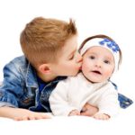 big brother kisses little sister