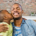 celebrate black dads son kisses father