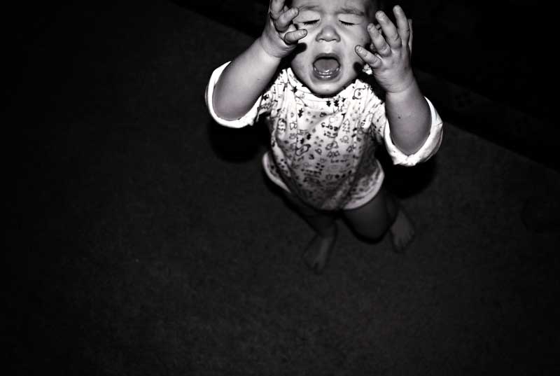 child throws tantrum