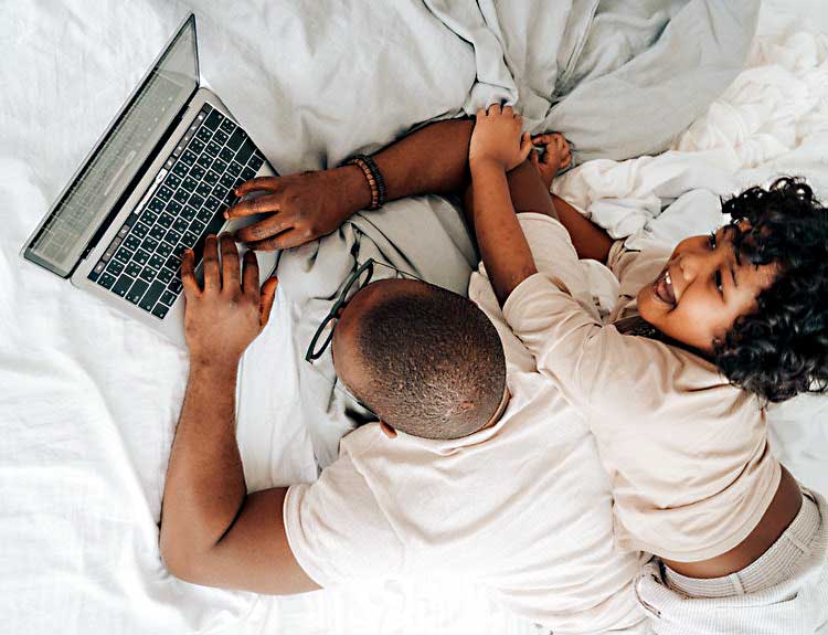 dad and child on laptop dad 2.0 digital