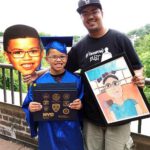 dad and son at school graduation