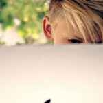 child at computer on social media