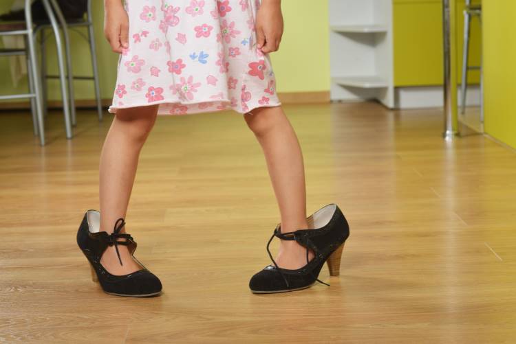 little girl in big girl shoes 1