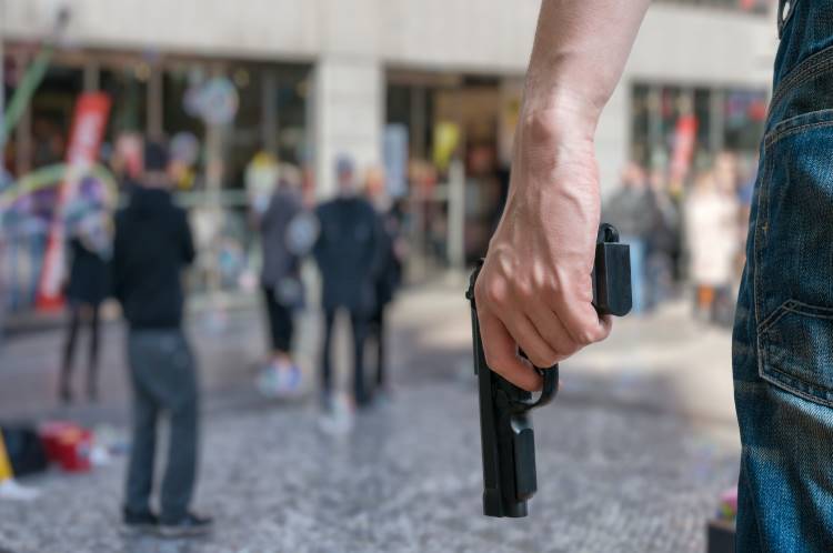 mass shooting public event handgun