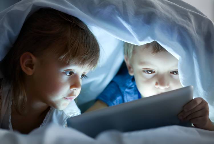 screen time no screens kids watch tablet under covers bed
