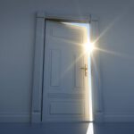 life transition as door opens to sunshine