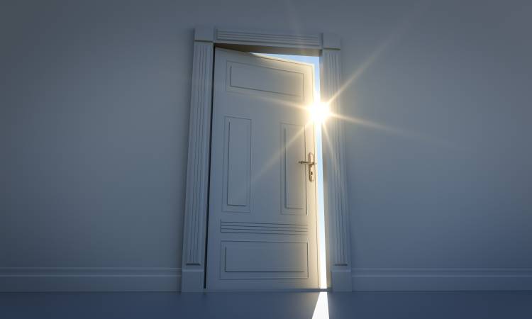 life transition as door opens to sunshine