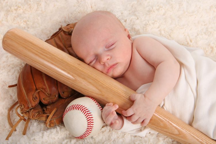 sleeping baby baseball bat glove