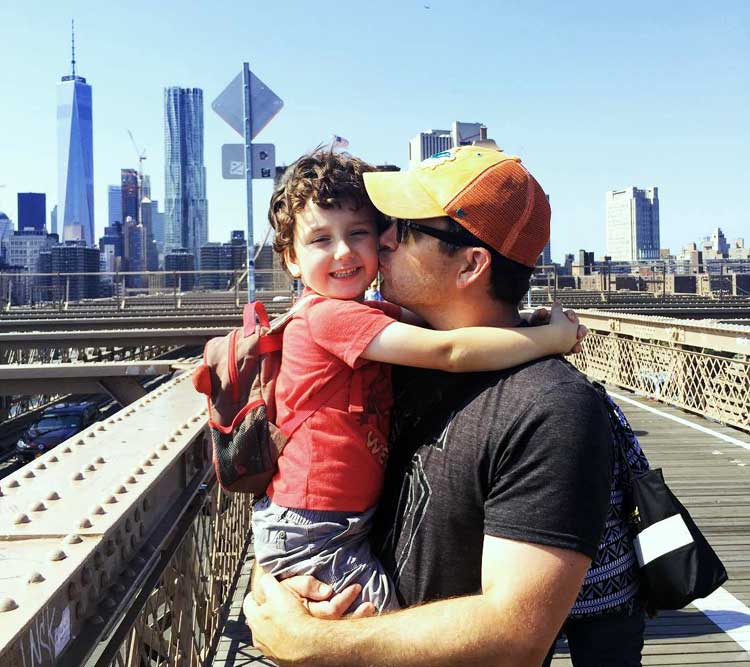 raising kids in nyc skyline brooklyn bridge
