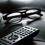 late show TV watching remote control glasses